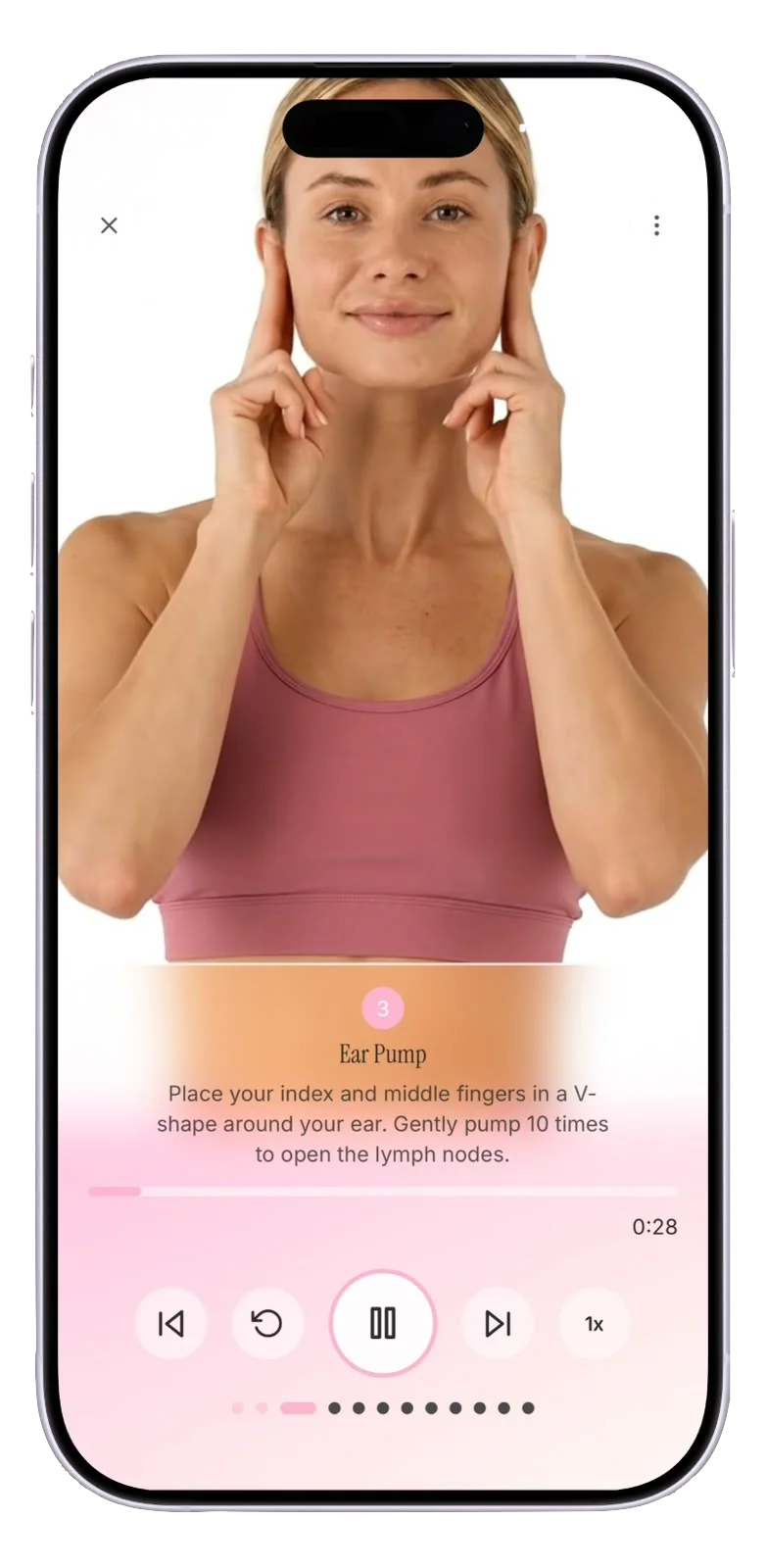 LymphFlow app playing a guided lymphatic drainage massage video with step-by-step voiceover instructions